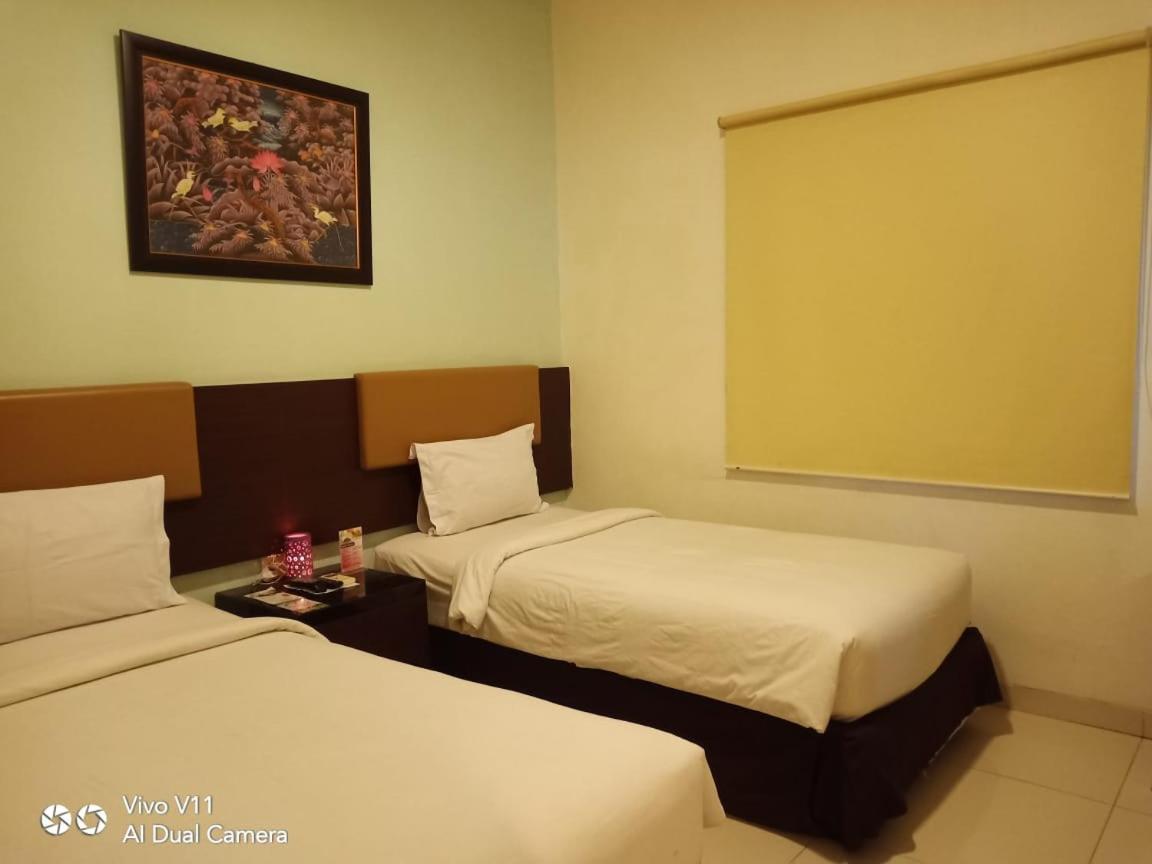 Ayla City Hotel Sorong Bagian luar foto