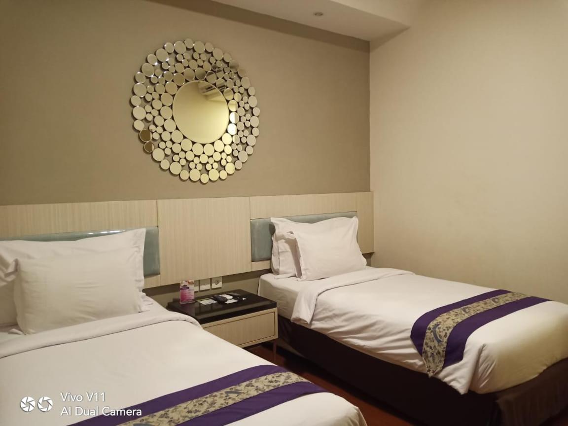 Ayla City Hotel Sorong Bagian luar foto